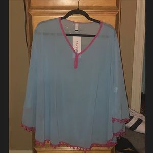 Blue cover up with Pom’s